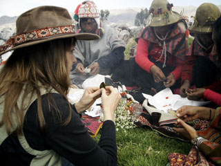 Carla Woody participating in a Q'ero despacho ceremony outside Cusco