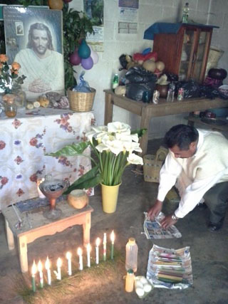Don Xun Calixto laying the curing altar